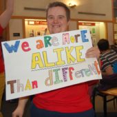 Man holding a sign