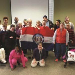 self advocates with the Missouri state flag