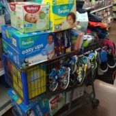 shopping cart full of holiday gifts