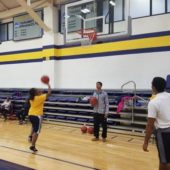 participants playing basketball