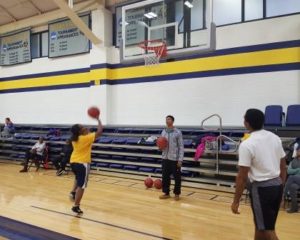 participants playing basketball