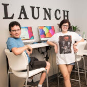 Young adults at the computers in the Next area